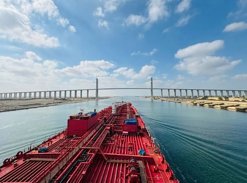 View from a cargo vessel passing beneath a bridge on the Suez Canal