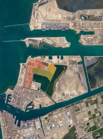 A cargo vessel navigating the Suez Canal